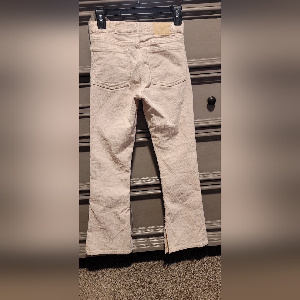 Zara girls pocketed  flared corduroy pants.
